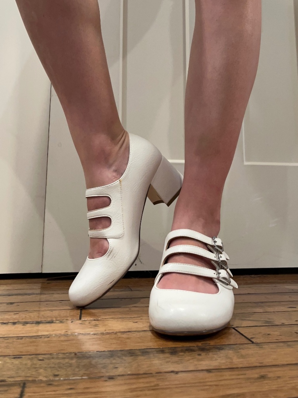 Well worn white heels